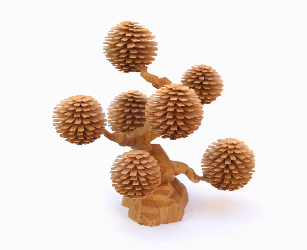  A stylised tree, carved from wood, with a modern design and elegant, minimalist lines.